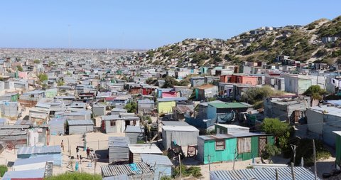 Cape Town, South Africa - January 28, 2021: Township number grow as land grab makeshift house are made and informal settlement grow and more shacks are build in Cape Town South Africa.  