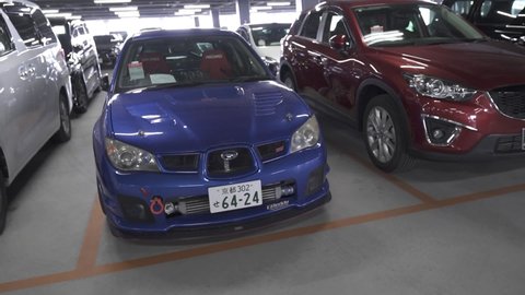 Kyoto , Japan - 04 16 2018: Arc Shot of a Blue Subaru WRX STI Performance Sedan Car.