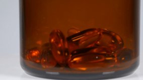 Vitamin D supplement, close up video clip