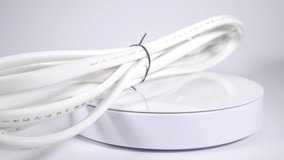 Extension cord power supply white, close up video clip