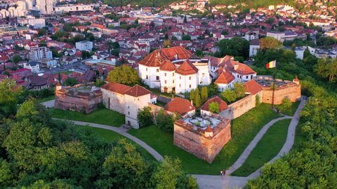 Aerial view Brasov Citadel, stunning sunset with medieval fortress in Transylvania, Romania
