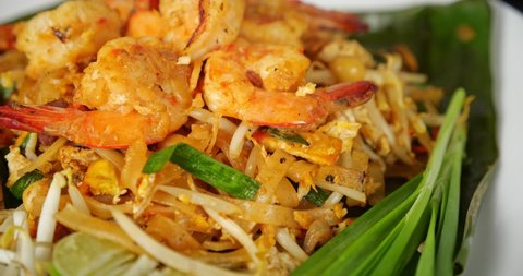 Thai traditional food, Shrimp Pad Thai, dry noodle, street food, Thai food style. Close up