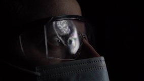 Head and Brain MRI Scan Analysed by Doctor Radiologist Wearing Glasses and Mask - Powered by Shutterstock - Get 15% off with code: PIKWIZARD15