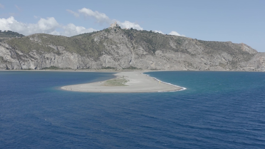 Aerial shots of the Marinello lakes in the Gulf of Tindari with the Sanctuary and archaeological area in Sicily, Italy.