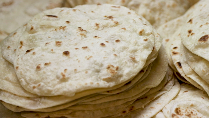 Scratch made corn and flour tortillas for mexican food Royalty-Free Stock Footage #1067036530