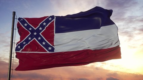 Flag of Mississippi waving in the wind against deep beautiful sky at sunset