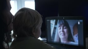 Mother and Child Making Distant Online Video Call Talking Via Online Web Chat. 2x Slow motion 60 fps