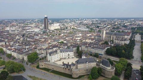Picturesque view from drone of modern and historical districts of Nantes in summer, Loire-Atlantique, France