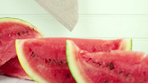 Watermelon slices on wooden vintage background.