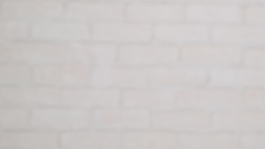 Man with prosthetic arm puts wedding ring on finger of woman