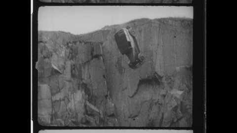 1930s Louisville, KY. Jalopy Car Drives off a Cliff and Crashes down the Mountain Side. 4K Overscan of Vintage Archival 16mm Film Print. 