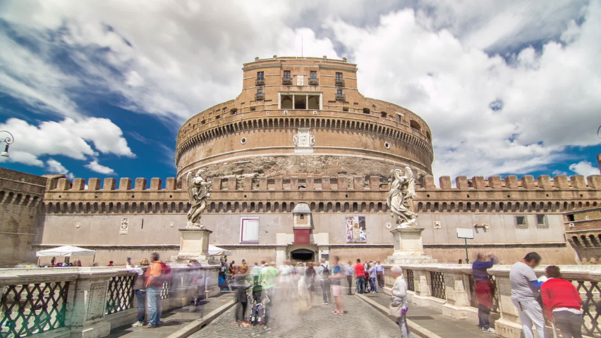 Saint Angel Castle Castel Sant Angelo from bridge Ponte Sant Angelo over the Tiber river timelapse hyperlapse, Rome, Italy. Statue on the side and cloudy sky Royalty-Free Stock Footage #1067092669