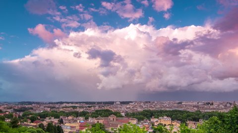 Panoramic aerial view of historic center timelapse of Rome, Italy. Cityscape with heavy dramatic colorful clouds and rain before sunset