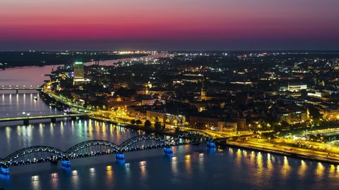 Establishing Aerial View Shot of Riga, Riga superwide Skyline, Latvia at night evening