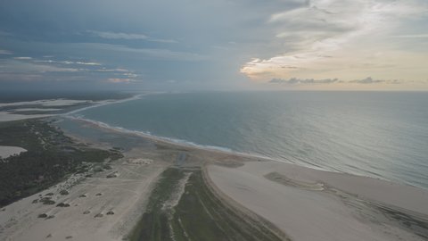 Aerial Hyperlapse of people moving at Jericoacoara on cloudy day. National Park, Brazil