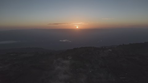 Aerial Hyperlapse of sun rising in mountainous region. Eldoret, Kenya