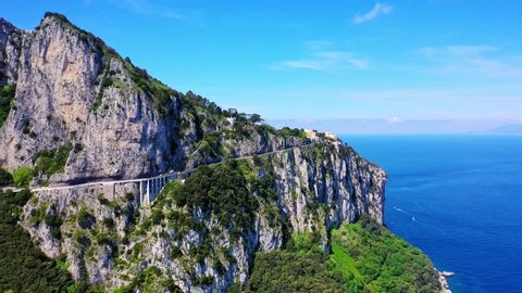 Drone shot of beautiful view of the road and sea on Capri Island, Italy