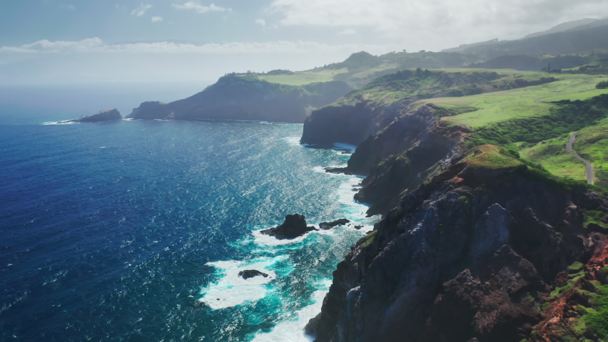 Scenic rocky coast nature background. Traveling pure nature of tropical island Maui, Hawaii, USA. Cinematic aerial view of wild nature the world famous coastline. Outdoors adventure and travel 4K Royalty-Free Stock Footage #1067130298