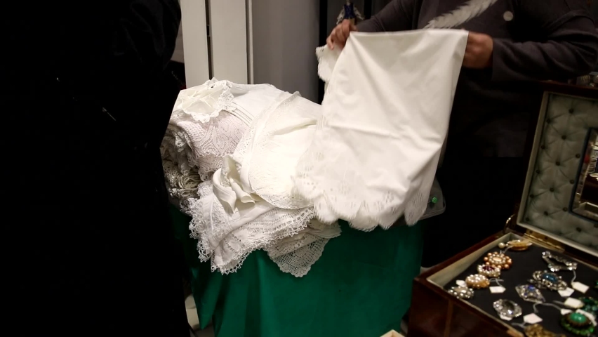 girl chooses vintage white bed linen pillowcases sheets and duvet covers vintage market.