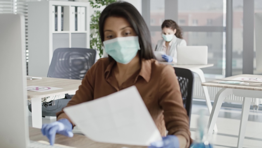 Video of women working respecting the safety rules during pandemic. Shot with RED helium camera in 8K. | Shutterstock HD Video #1067144620