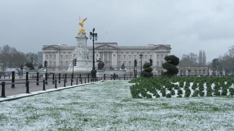 LONDON, UK - FEBRUARY 9, 2021: Snow at Buckingham Palace during COVID-19 Lockdown, Quiet Streets, London, England, UK