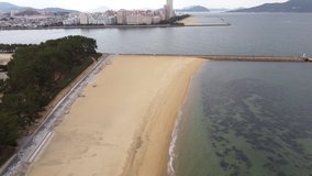 Video taken from the sky using a drone on a sandy beach in Fukuoka Prefecture