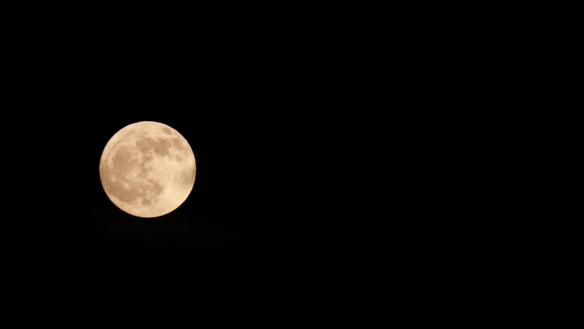 Full moon at night on dark black sky., a Nature Video by Anetlanda