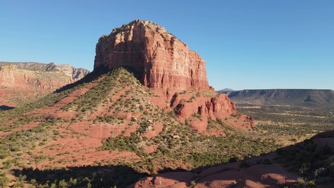 Aerial dolly, sedimentary red rock formation Courthouse Butte in Sedona, USA