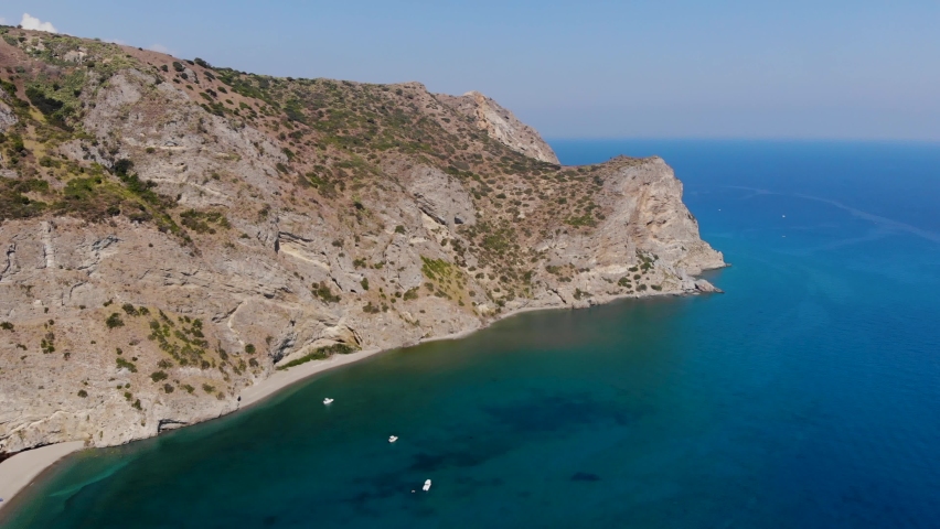 Aerial shots of the Marinello lakes in the Gulf of Tindari with the Sanctuary and archaeological area in Sicily, Italy.