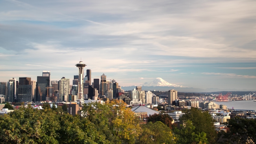 Day to Night Sunset Timelapse of Seattle. Space Needle, Downtown Skyline and Mt. Rainier from Kerry Park with a wide panoramic view