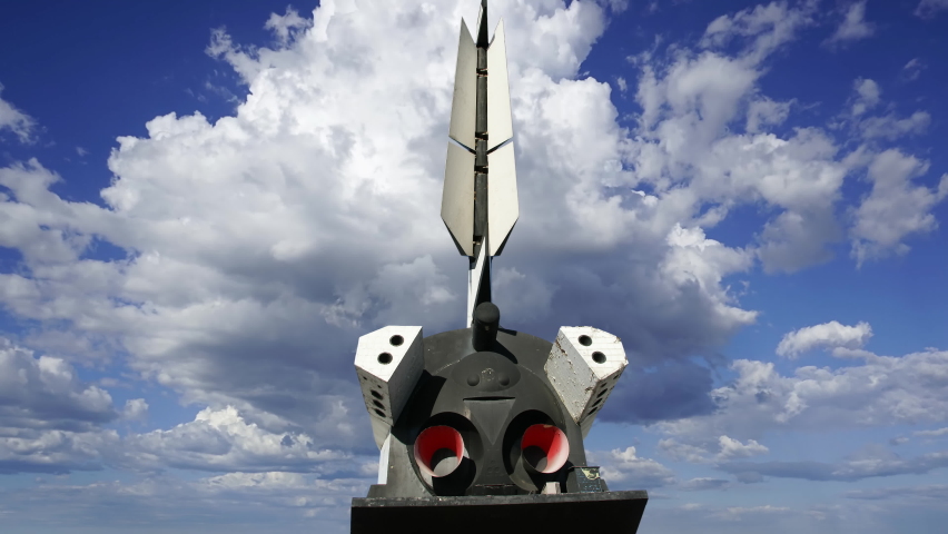 The Buran spacecraft (Buran-- written in Russian) -- Soviet orbital vehicle, against the moving clouds  