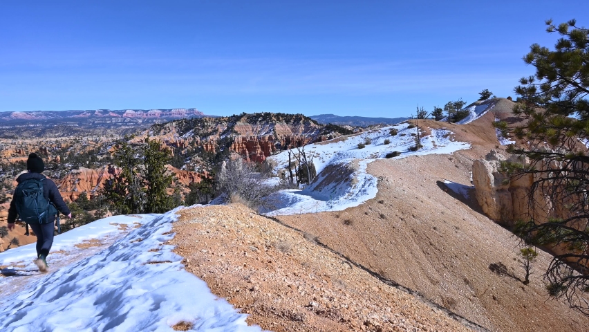 Hiking through the rim of Bryce Canyon National Park, Utah, USA, winter time