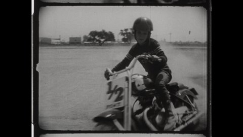 1940s Sturgis, SD. Young Kid does Motorcycle Donuts and Spin outs on Harley Davidson Motorcycle. 4K Overscan of Vintage Archival 16mm Film Print
