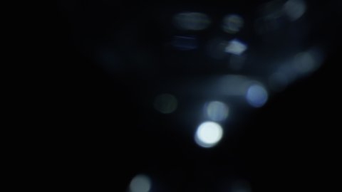 4k Abstract crystal bokeh in the dark. Overlay background for editing. Luminary Light Leaks 4k footage