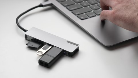 Connecting a USB hub dongle on a laptop computer