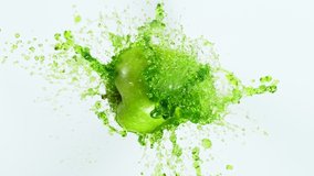 Super Slow Motion Shot of Fresh Green Apple with Splashing Juice. Filmed on High Speed Cinema Camera - Powered by Shutterstock - Get 15% off with code: PIKWIZARD15