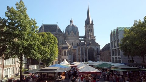 Aachen , Germany - 08 22 2019: Wine festival with market stands and the Aachener Dom, located on the Katschhof square in the german city of Aachen