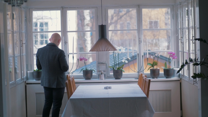 Man talking angrily on the phone when working from home