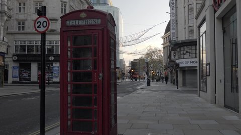 London , United Kingdom (UK) - 11 12 2020: Iconic Red Telephone Box On Coventry Street During Lockdown In London. Locked Off 