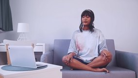 African american woman practising Breathing Exercises for Relaxation . Healthy lifestyle. High quality 4k footage