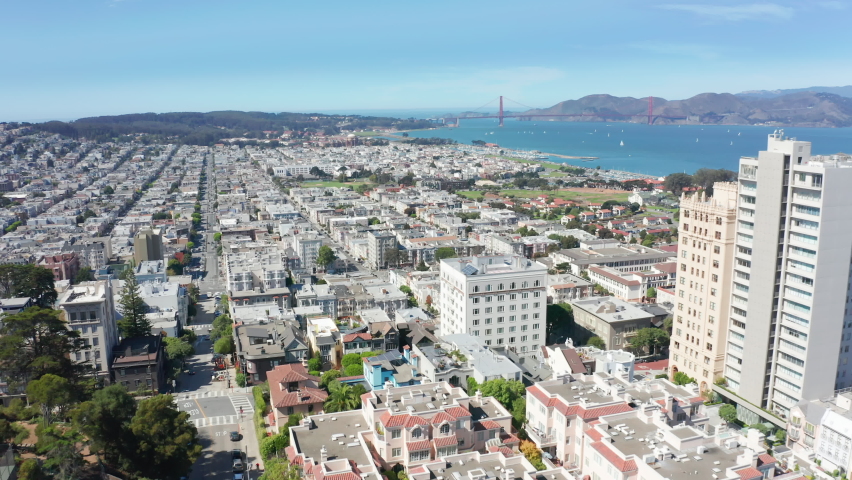 San Francisco, CA, USA. Dense sections of residential houses by the Bay Area. Famous landmark at Golden Gate Channel. High quality 4k footage