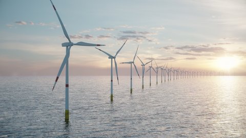 Camera pulls back to show an aerial view of a long row of offshore wind turbines in the sea against low sun. Green and renewable energy concept. Realistic high quality 3d animation.