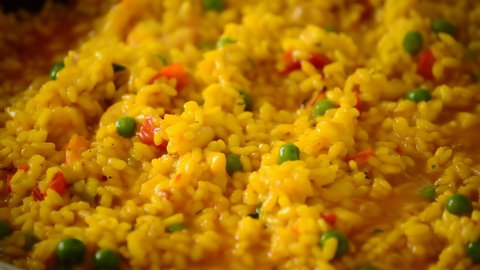 Paella rice cooking,  Boil oily pilaf close