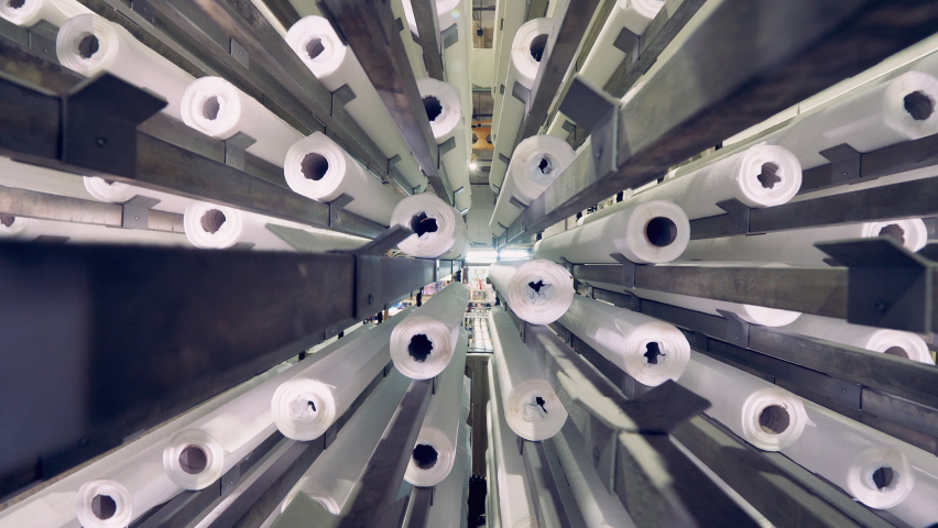 Inside view of a metal machine transporting paper rolls Royalty-Free Stock Footage #1067270578