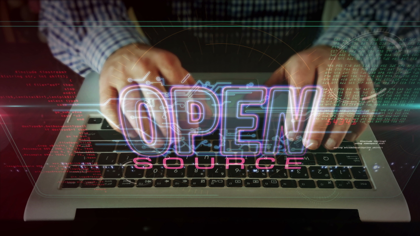 Open source code programmer. Business, computer, developer, free software and freedom in internet concept. Camera moving with man typing on computer keyboard. Futuristic abstract 3d rendering.