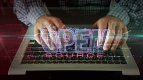 Open source code programmer. Business, computer, developer, free software and freedom in internet concept. Camera moving with man typing on computer keyboard. Futuristic abstract 3d rendering. - Powered by Shutterstock - Get 15% off with code: PIKWIZARD15