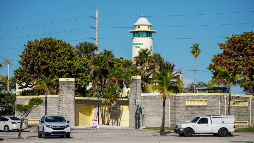 Miami 8k timelapse Haulover Parking lot and view of lifeguard headquarters lighthouse tower