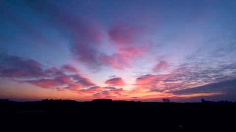 Beautiful winter sunrise over fields - timelapse 