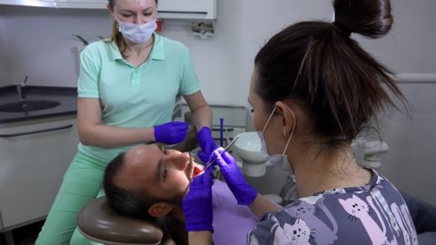 The Dentist Is Examining The の動画素材 ロイヤリティフリー Shutterstock