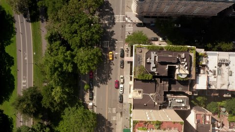 Aerial Birds Eye Overhead Top Down View of New York City street at central park on beautiful sunny summer day 